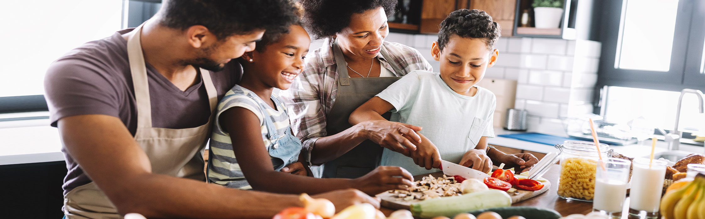 Image of family cooking in the kitchen
